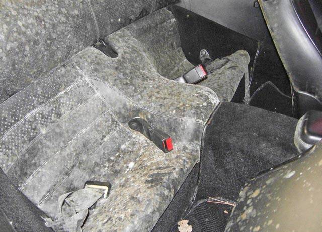 Car floor carpet with visible mold spot